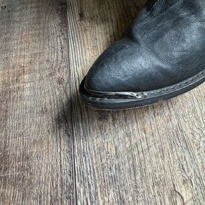 Black leather cowboy boots